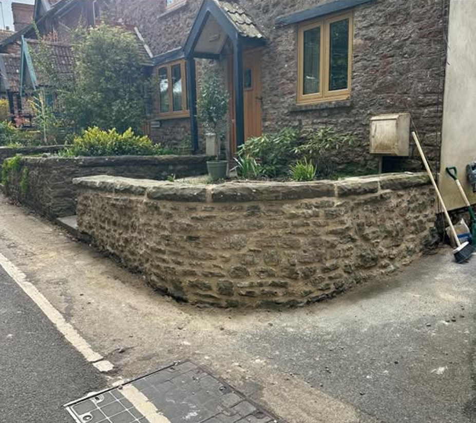 Stone wall after brickwork repointing